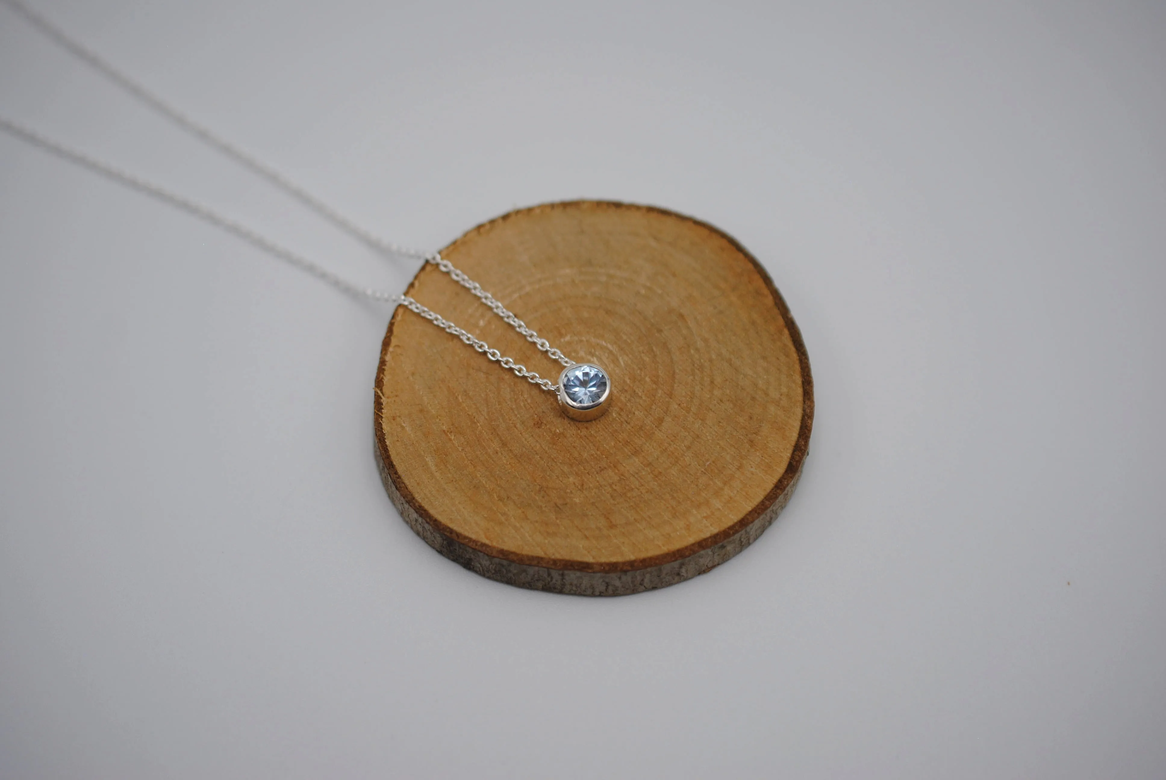 Birthstone Necklace: Round Aquamarine, Bezel, Silver, Cable Chain